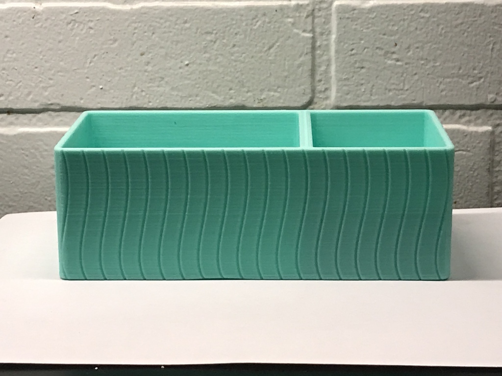 Simple Stationairy Supplies Organizer displayed in cyan against a white background.